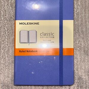 Moleskine hard cover ruled notebook pocket